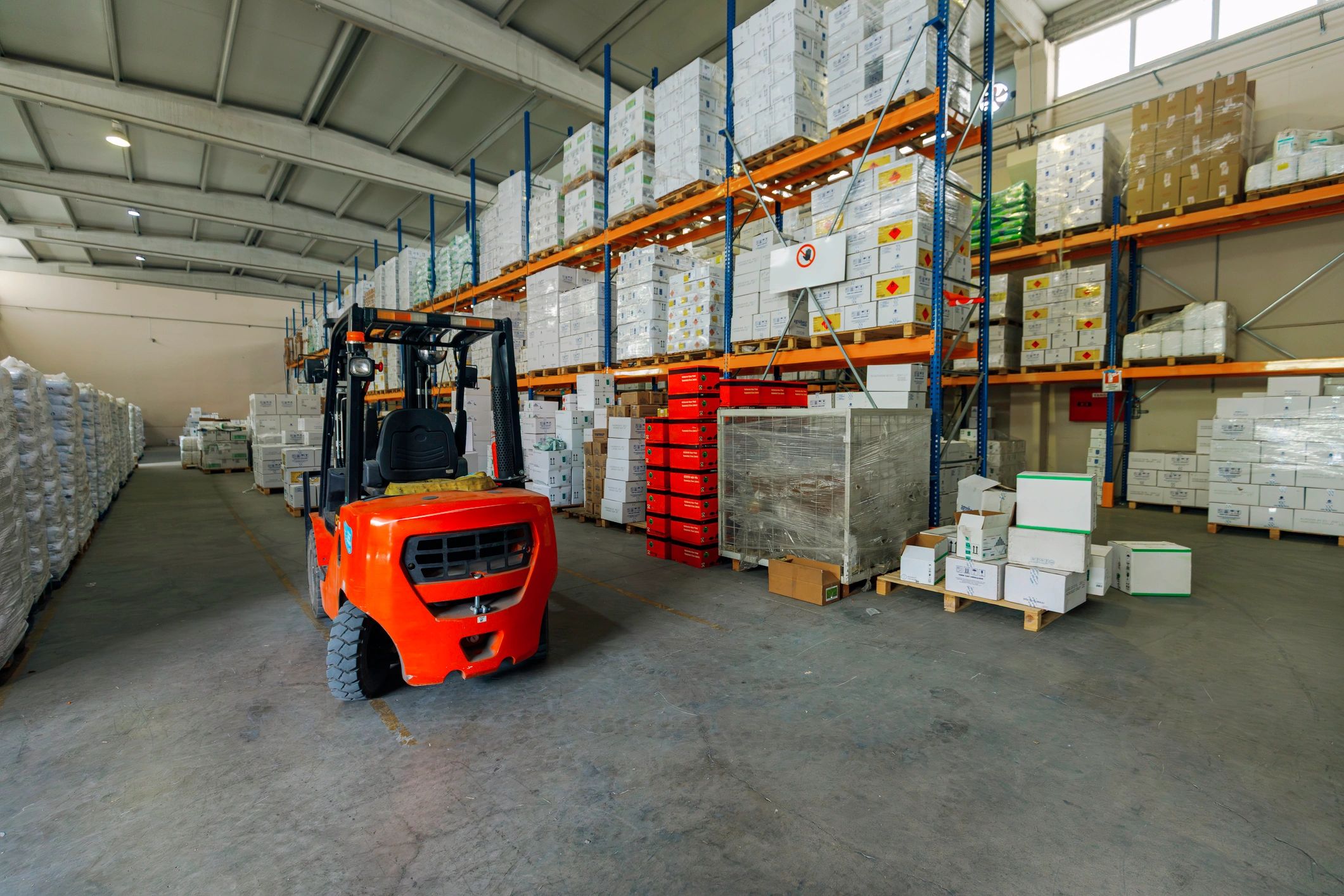 Modern warehouse aisle with packaged goods ready for distribution